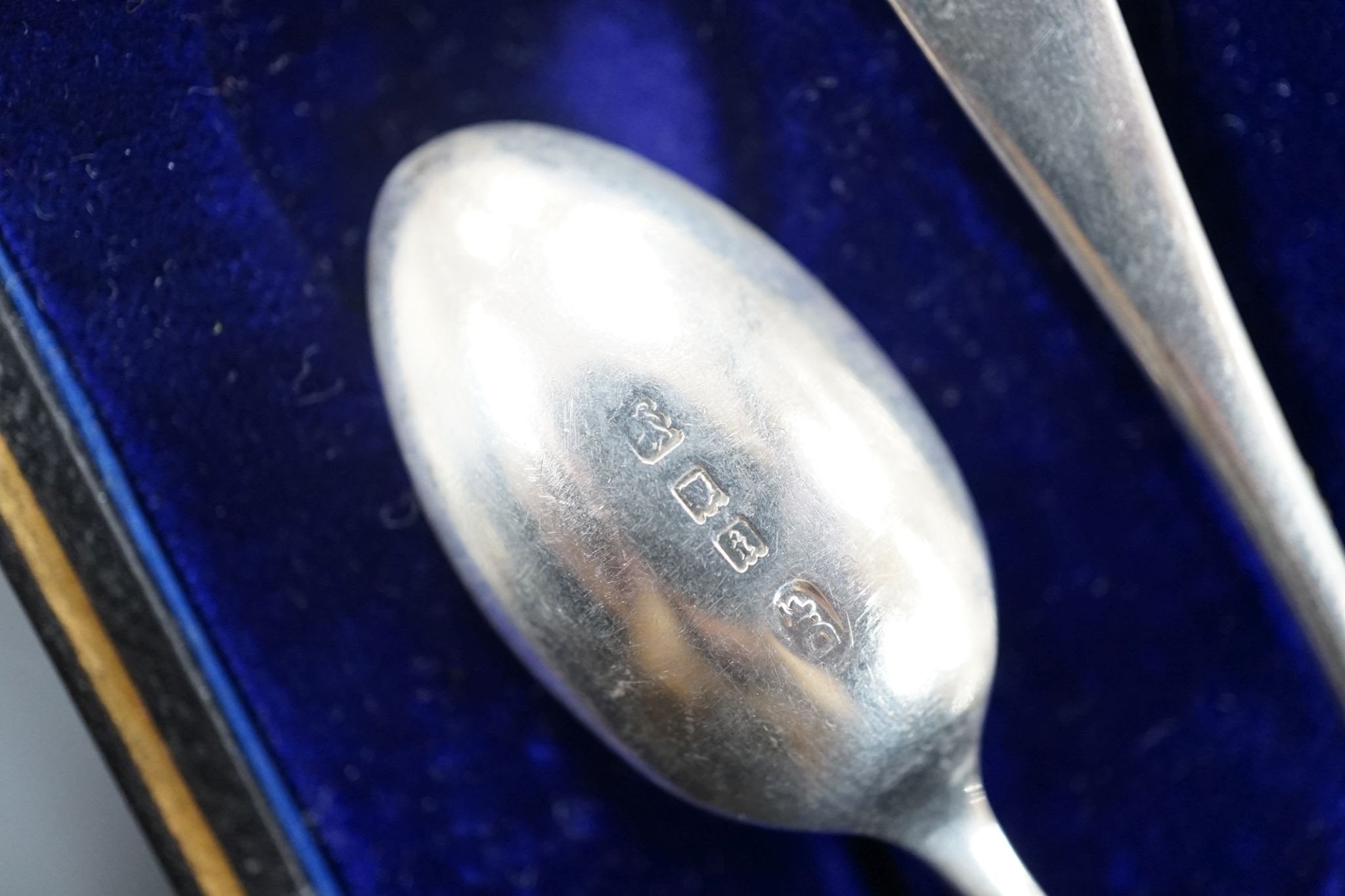 A set of six silver teaspoons, a silver two handled small butter dish, with glass liner and silver mounted cut glass toilet jar.